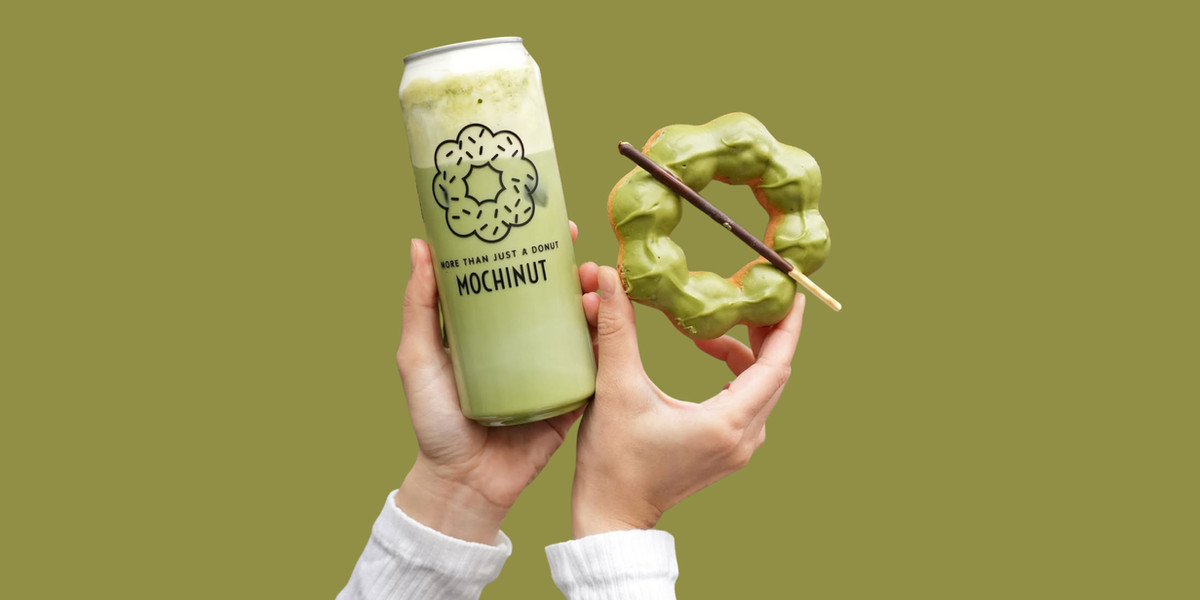 A matcha mochi donut paired with iced matcha latte